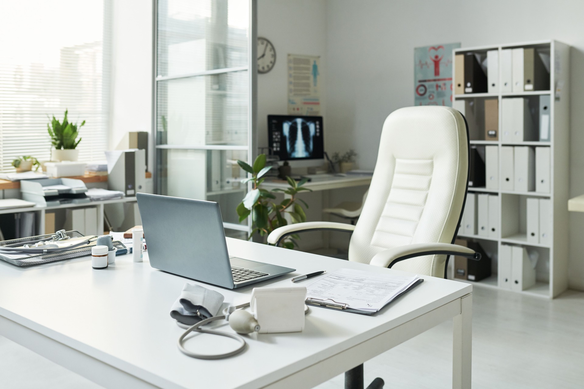 Medical Office Desk Displaying Diabetes Patient Chart and Diagnostic Equipment